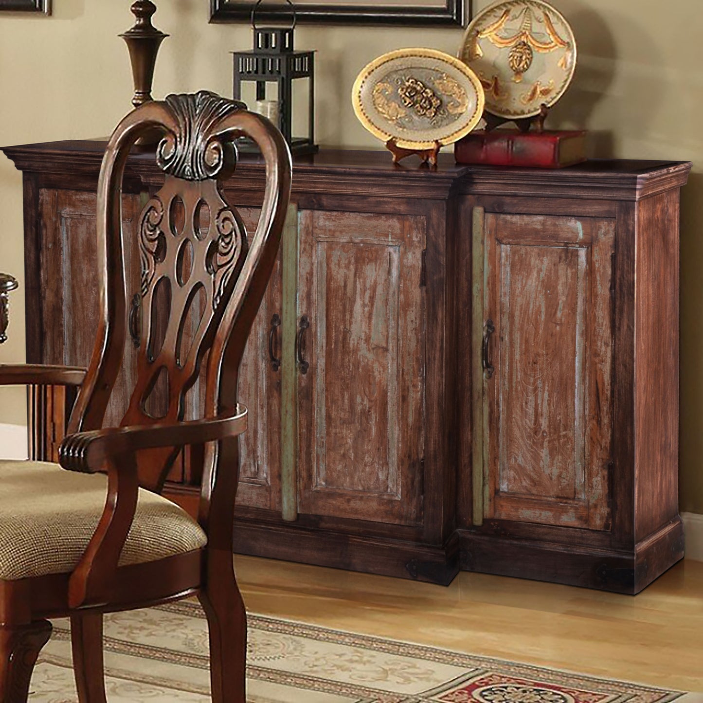 Decorated natural finish sideboard in a dining room