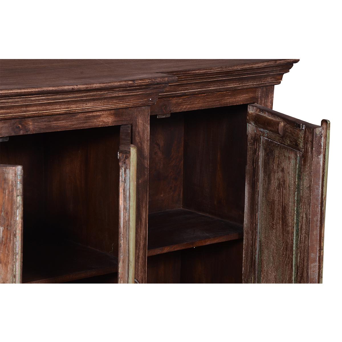 Detailed view of drawer showing space of natural finish sideboard.