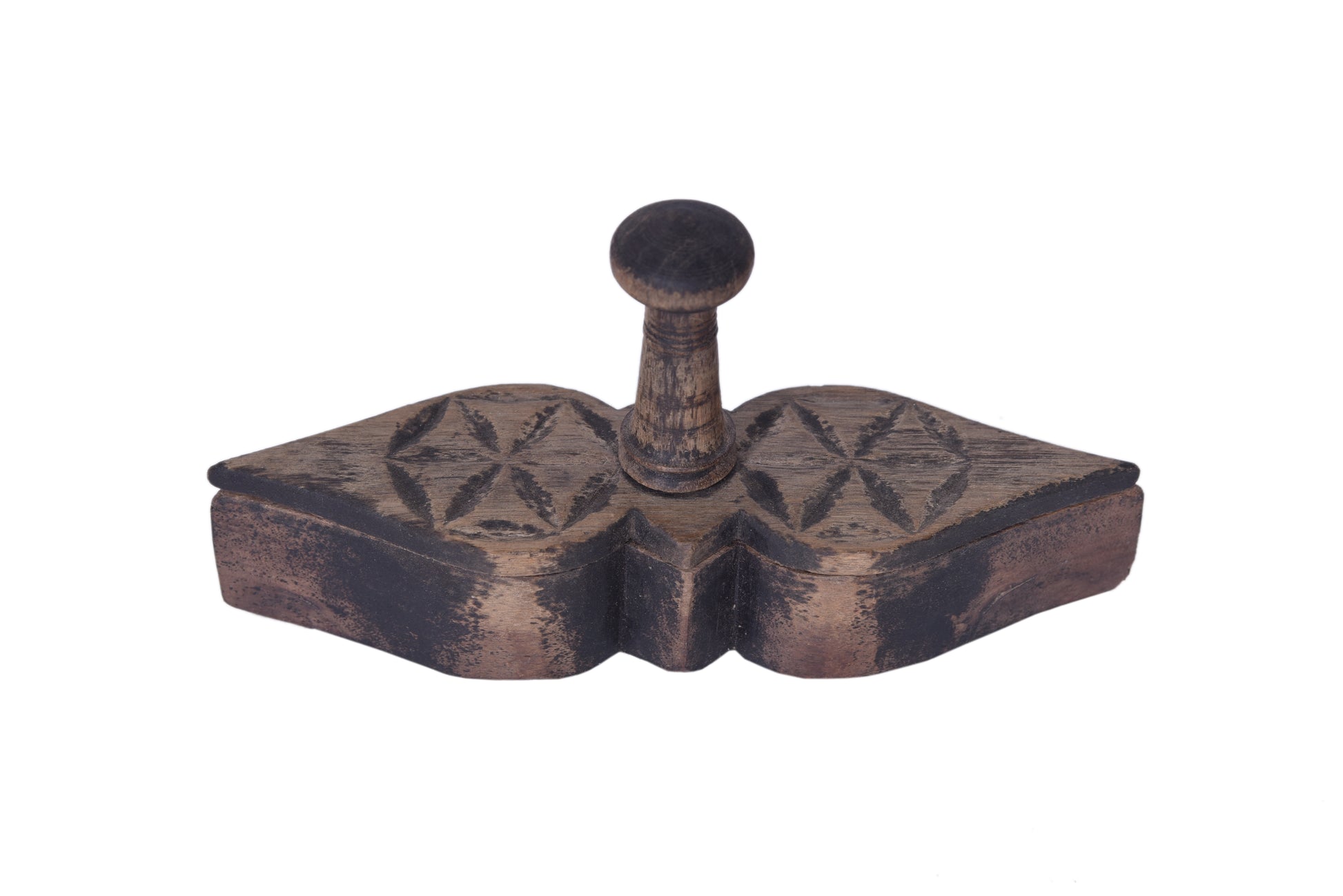 Wooden decorative box with intricate carvings.