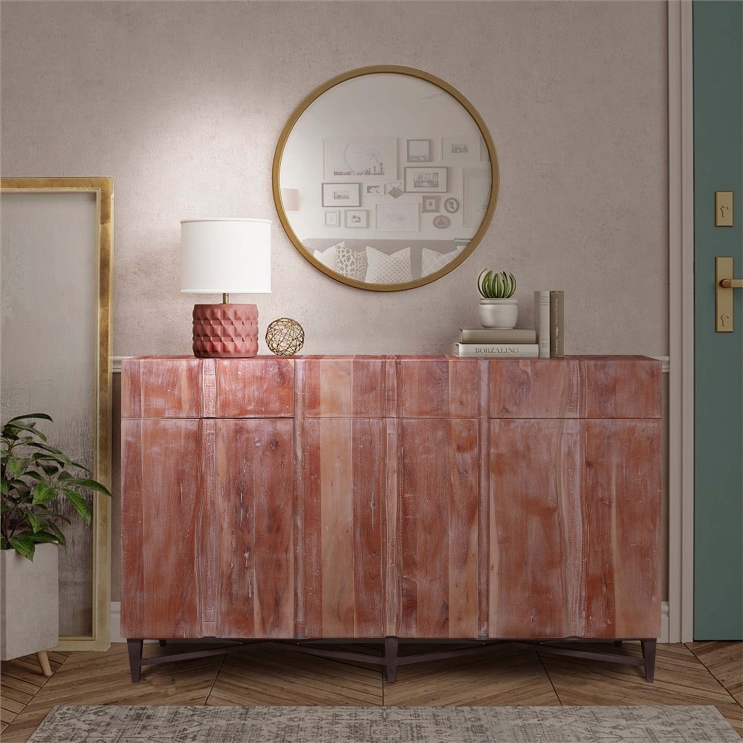 Sideboard styled with a mirror and décor.