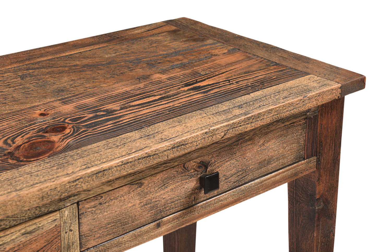 Close-up of sofa table’s detailed wooden craftsmanship.