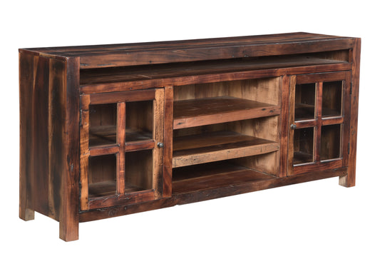 Side view of a distressed wood media cabinet.