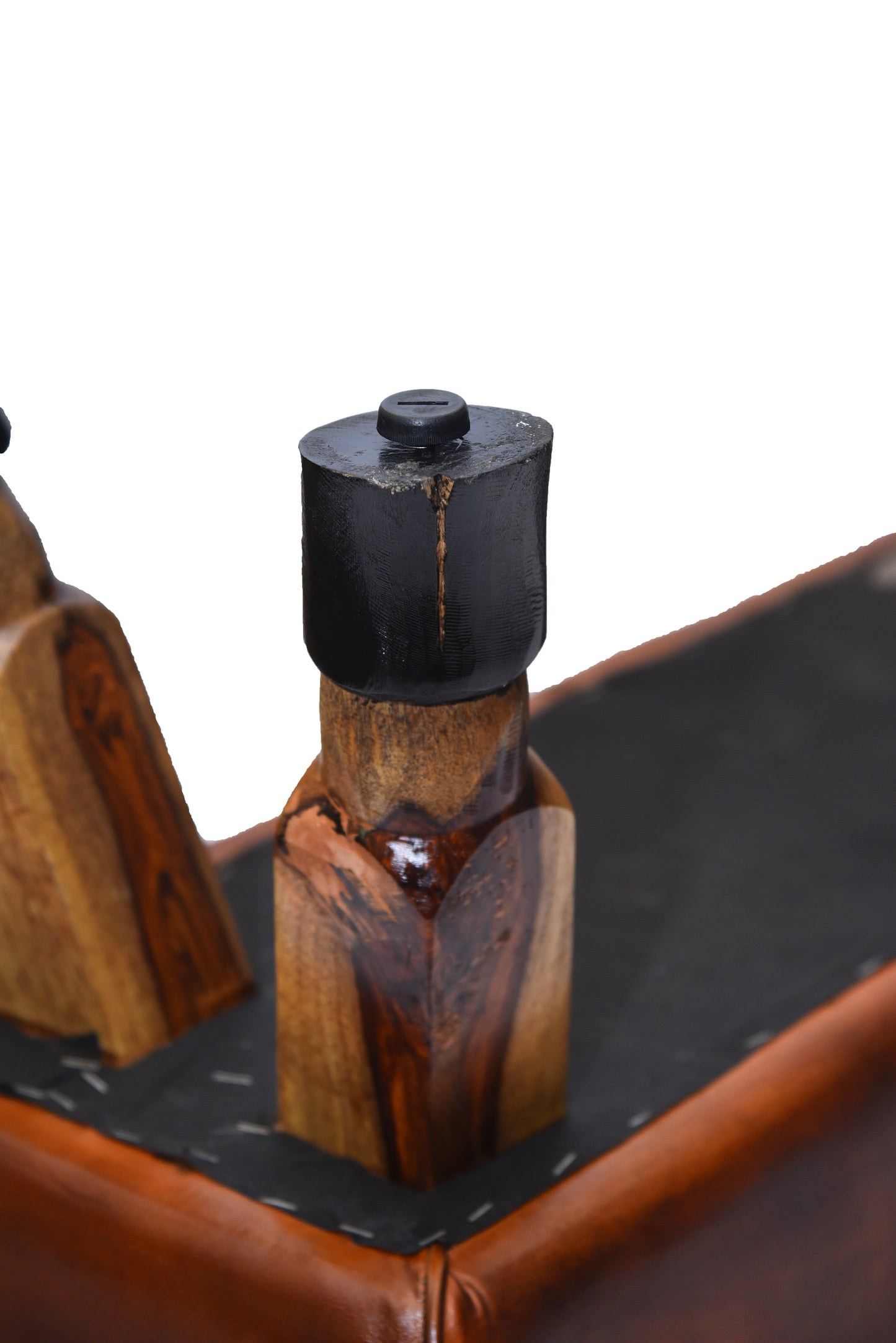 Detailed shot of vintage leather finish on bench
