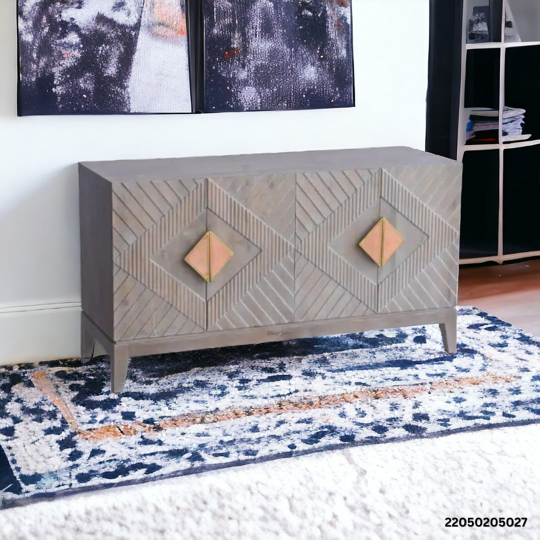 Sideboard styled in a modern living space with decor.