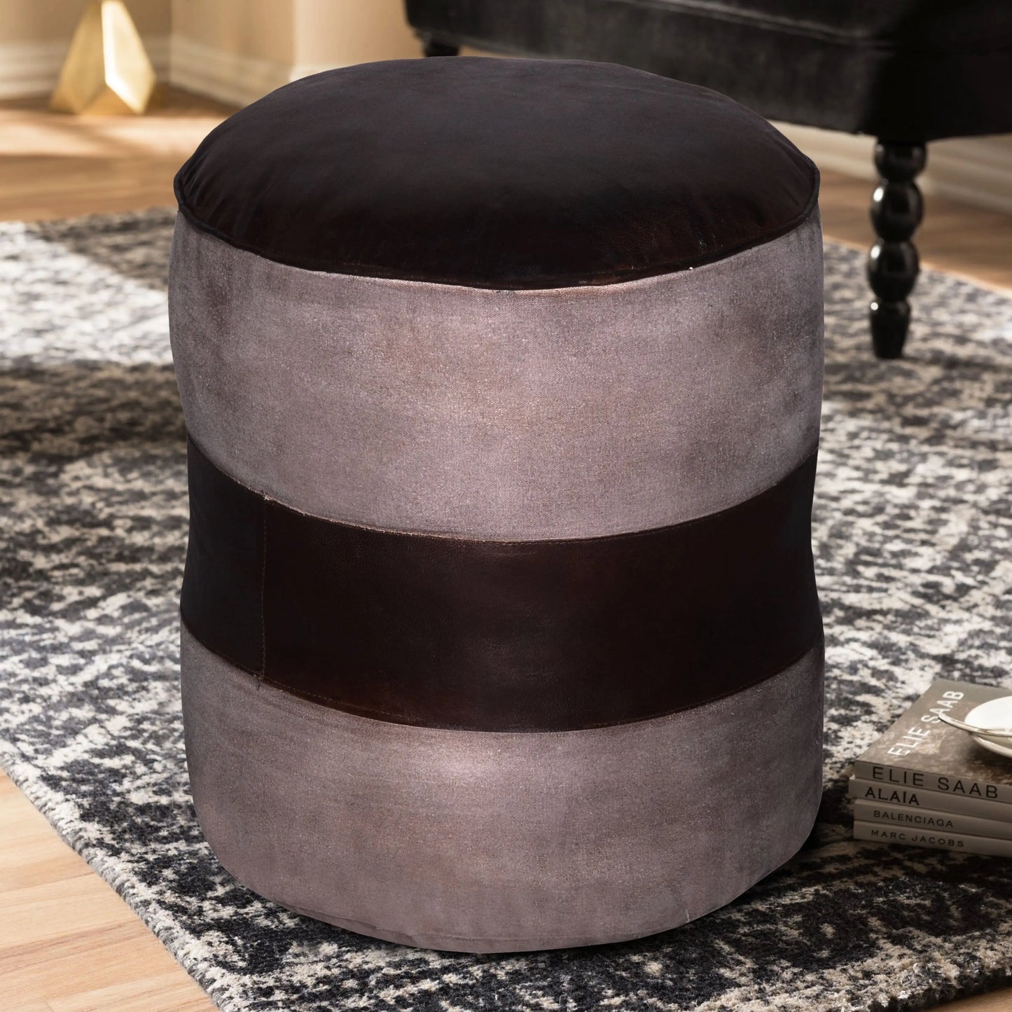 Leather pouf on rug