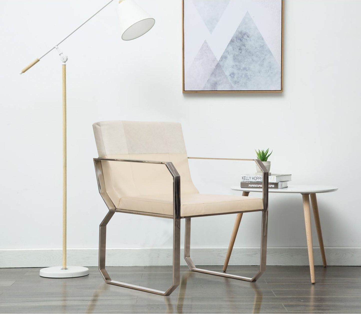 Modern cream-colored Dining Chair with silver-finished frame.