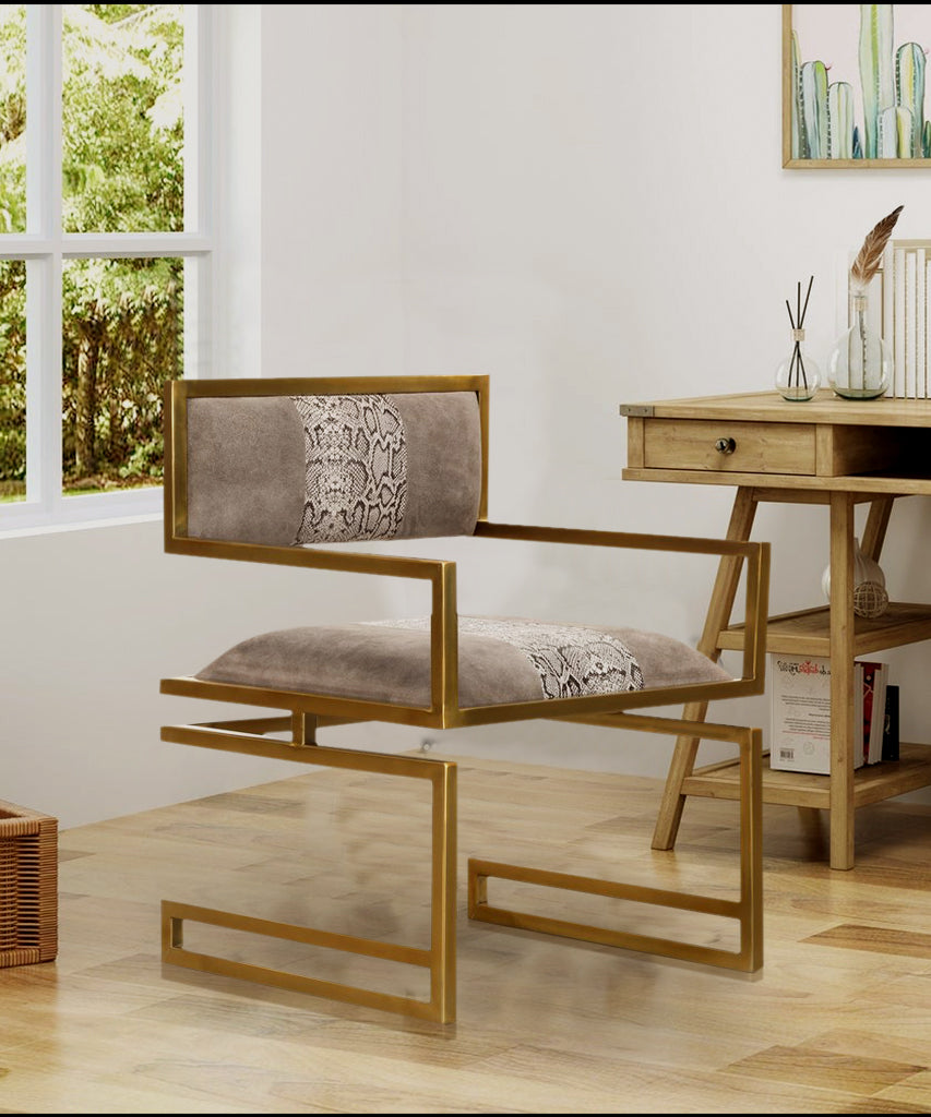 Luxury snakeprint leather chair with gold-finish frame.