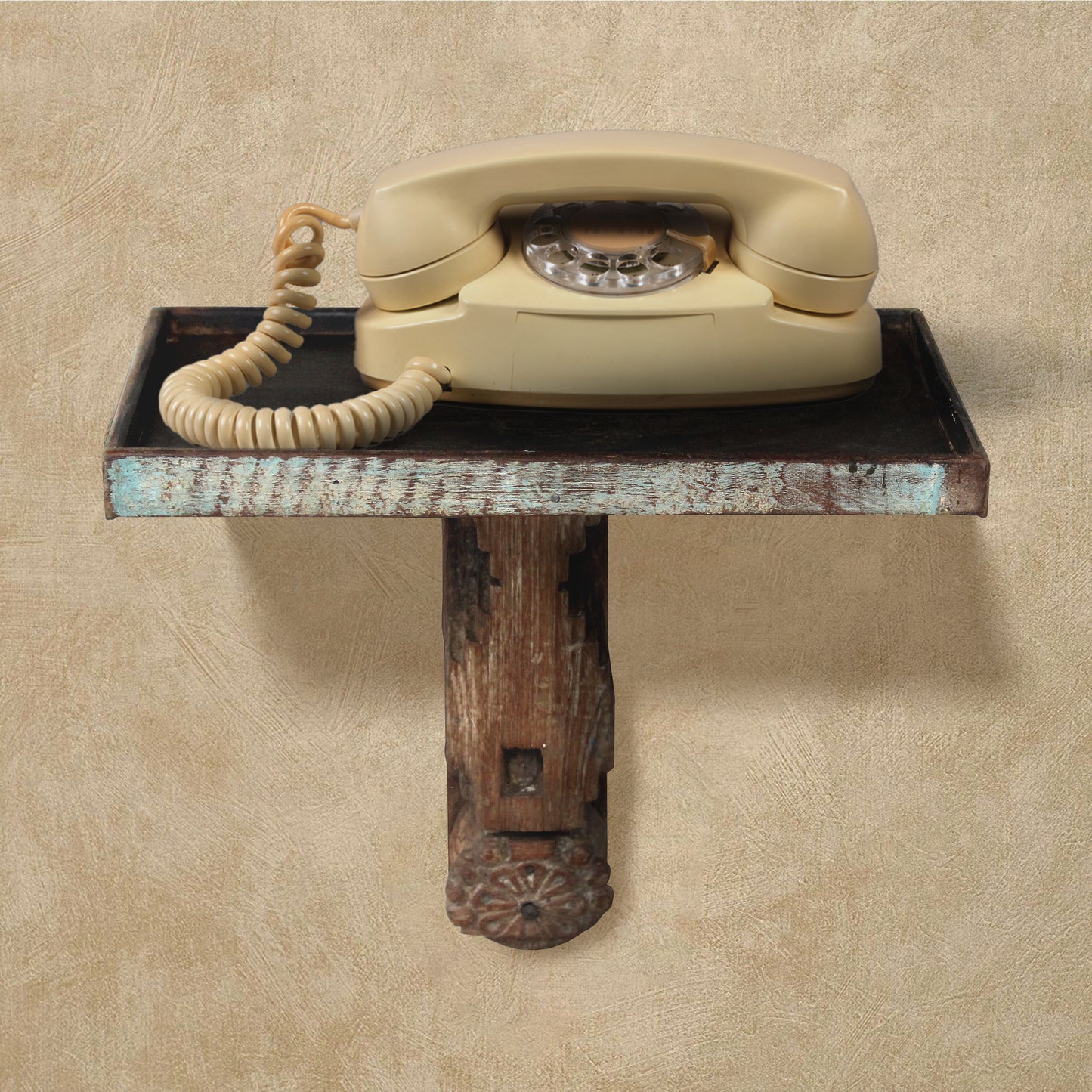 Wooden stand with vintage telephone.