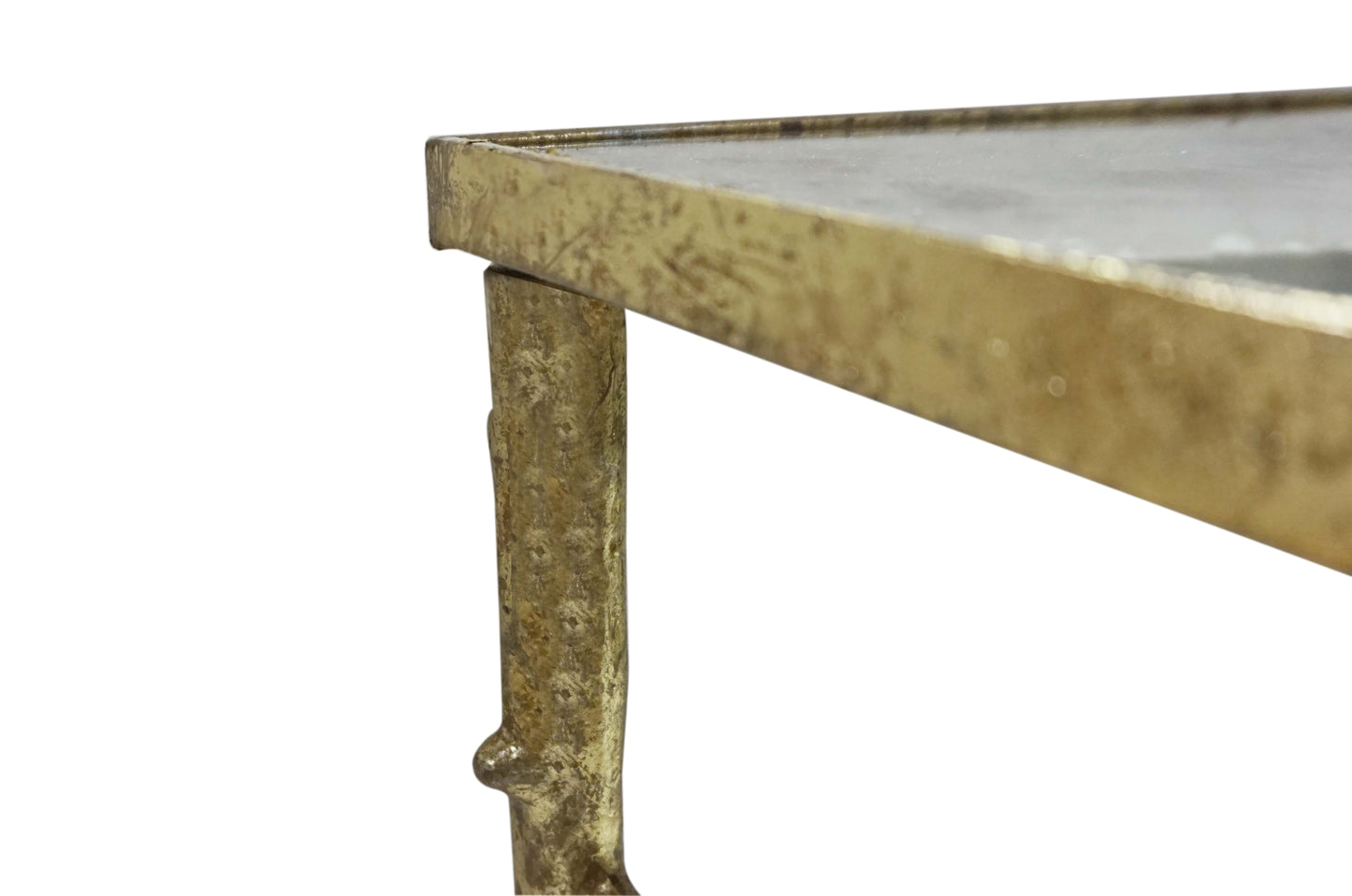 Close-up of antique mirror coffee table details.