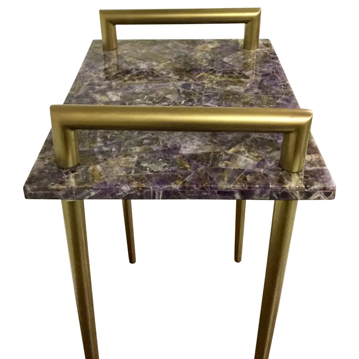 Top view of marble end table with gold legs.