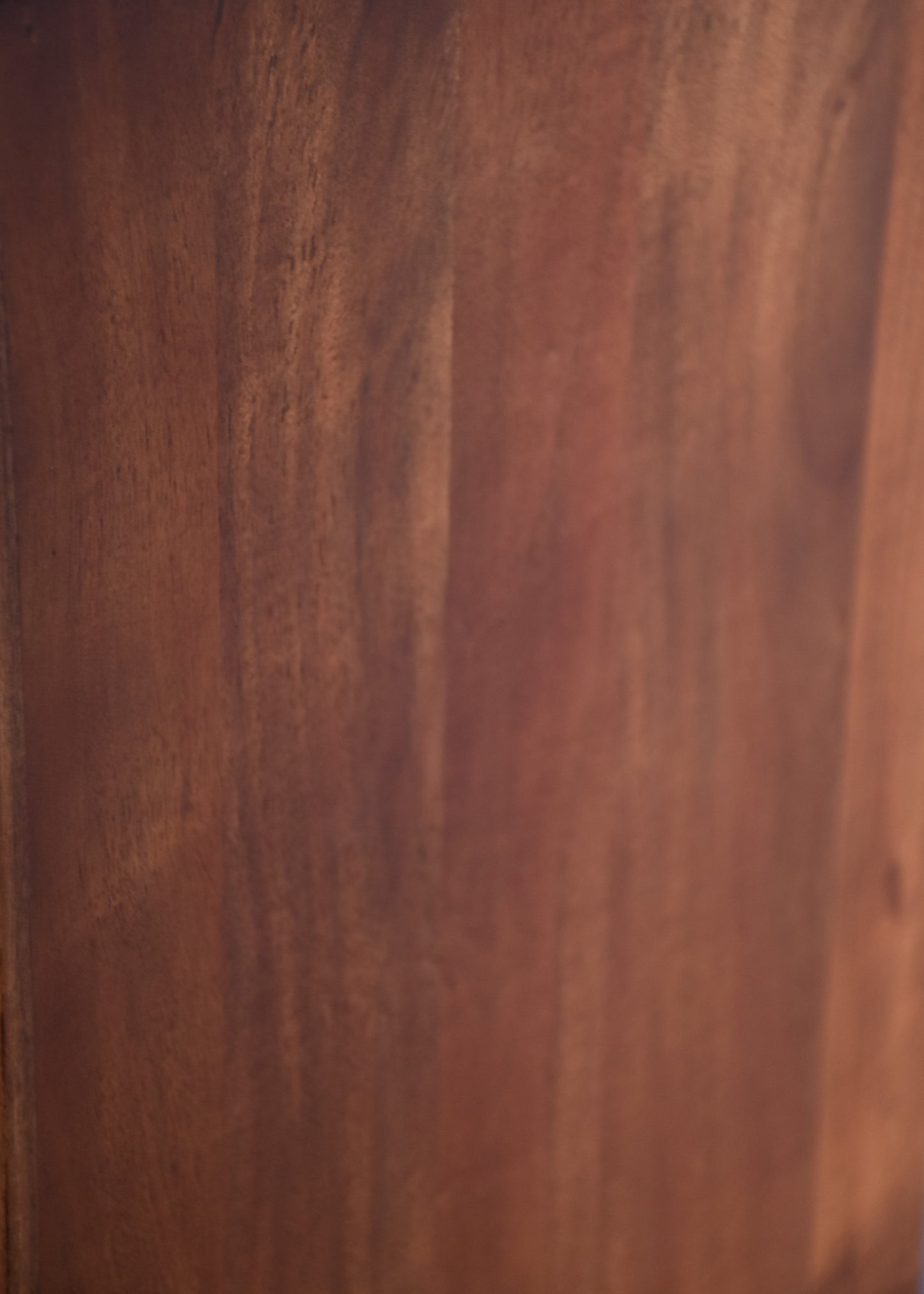 Detailed shot of cabinet wood texture.