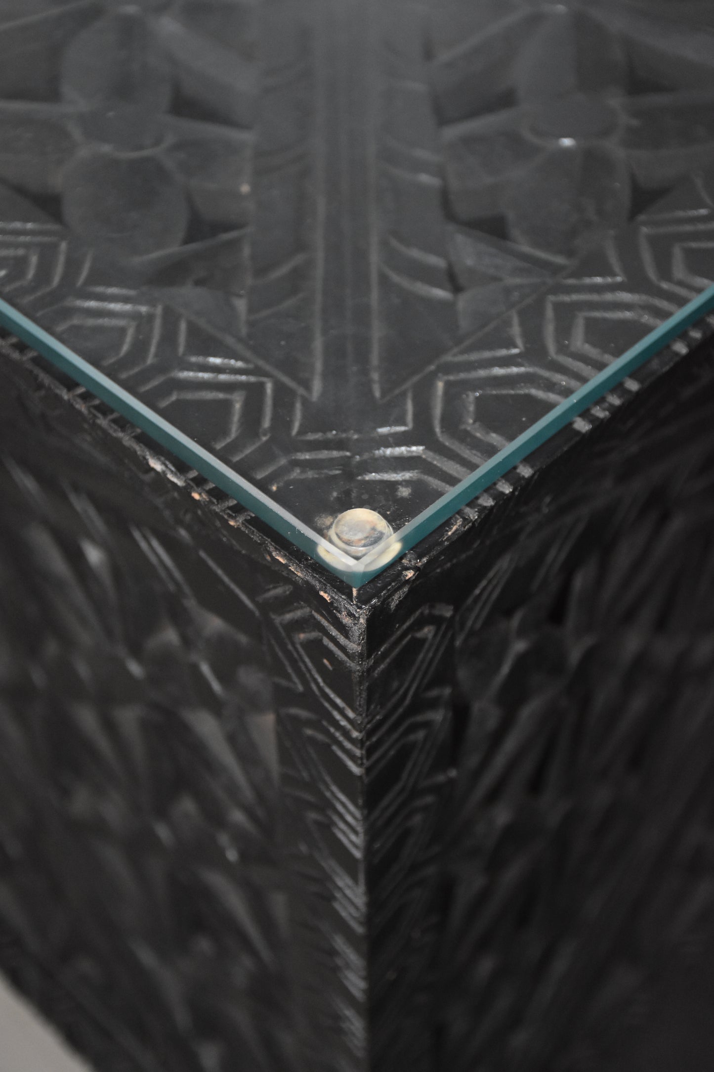 Glass view of black coffee table.