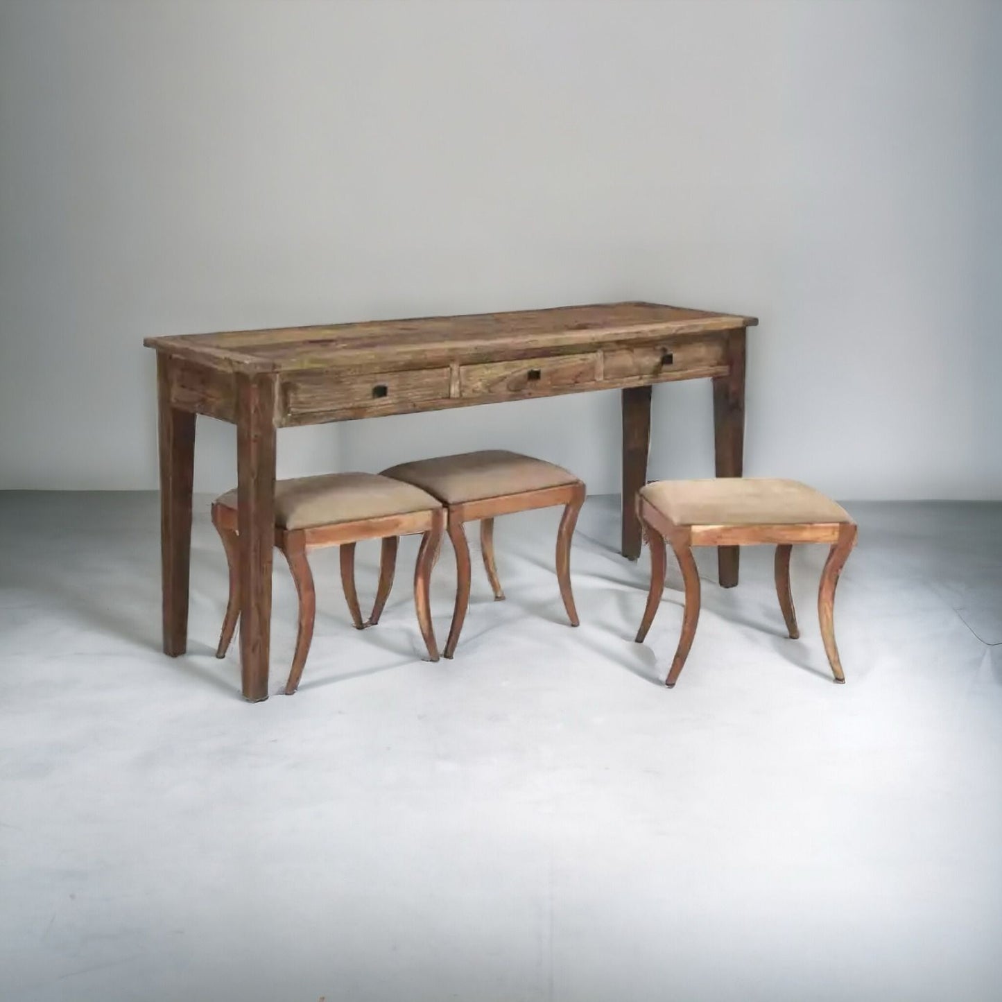 Rustic-style sofa table with stools for extra seating.