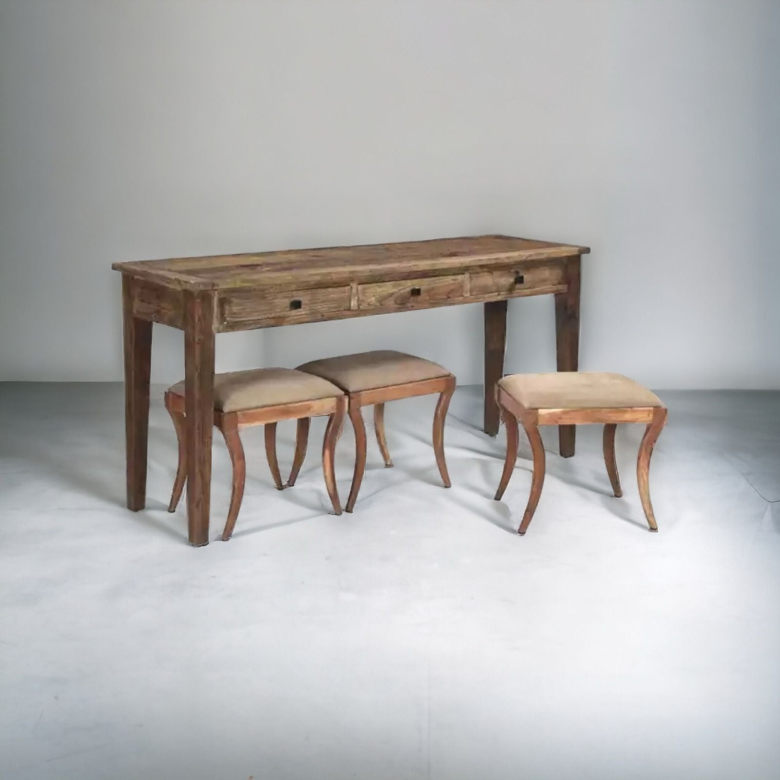 Rustic-style sofa table with stools for extra seating.