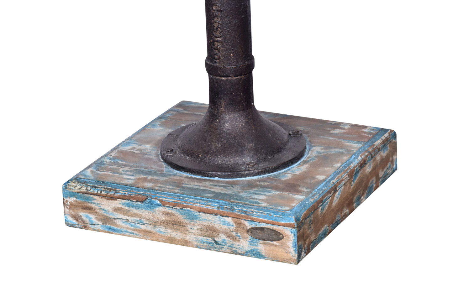 Detailed view of the wooden base of the hand pump plant stand.