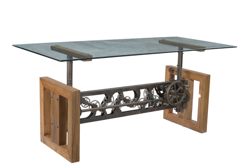 Close-up of dining table’s iron gear mechanism.