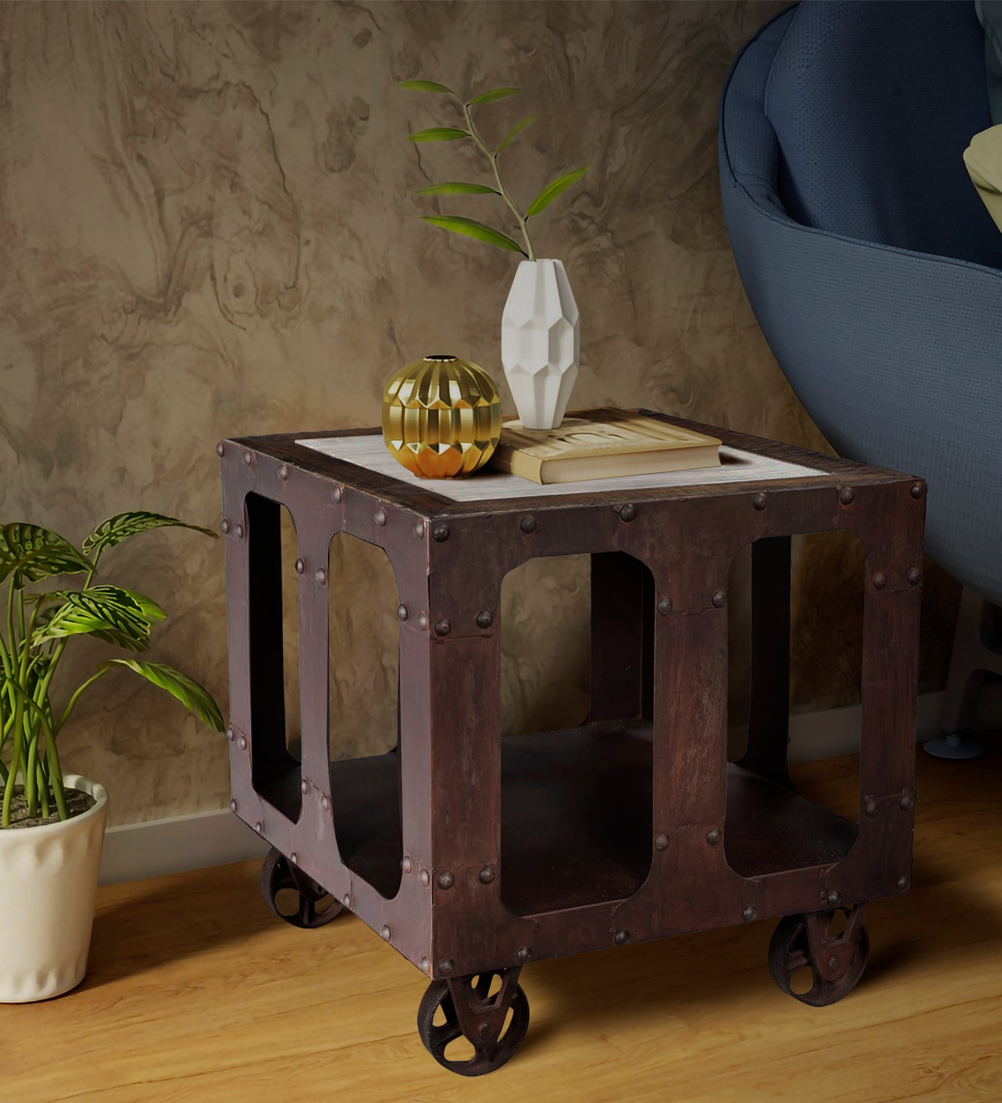 Compact end table with iron frame and open shelf.
