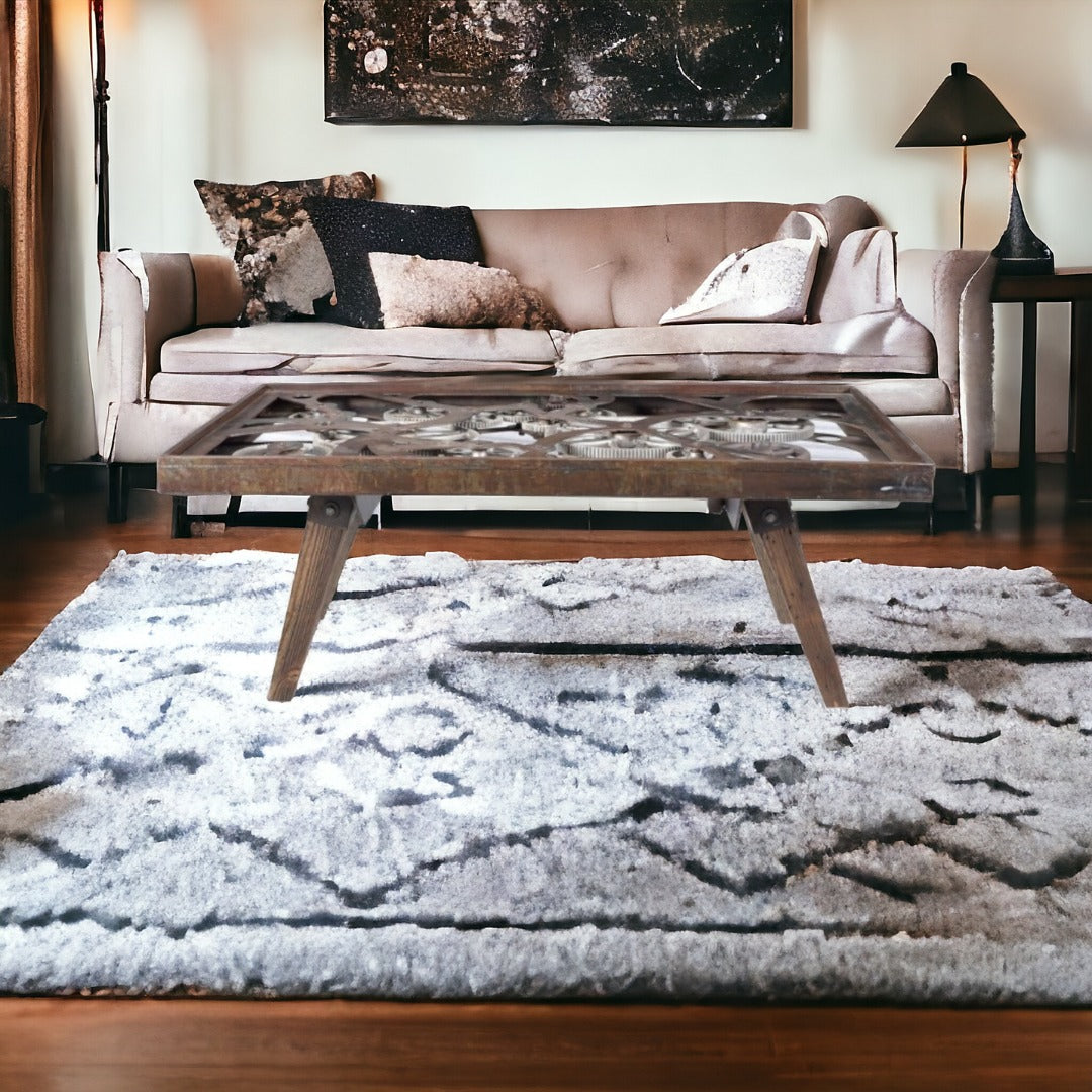 Glass coffee table in a modern living room.