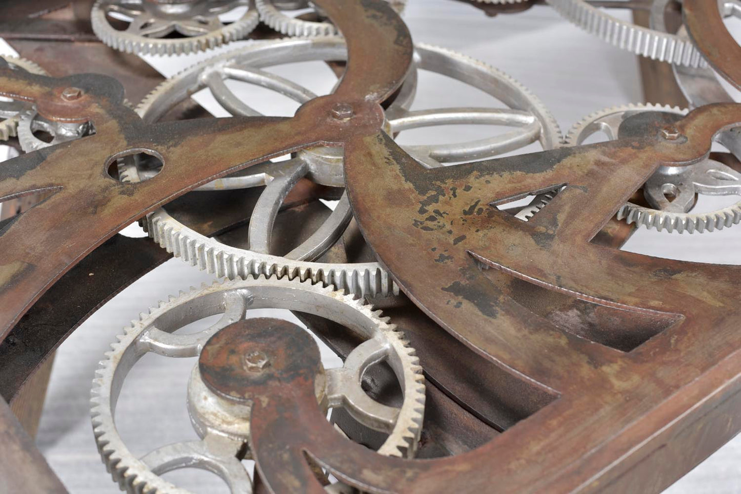 Close-up of gear mechanism under glass.