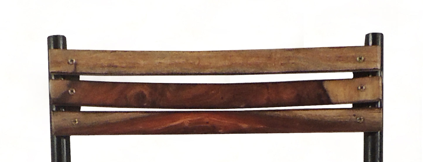 Close-up of bar chair’s seat wood.