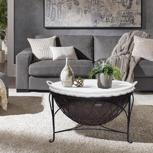 Elegant coffee table with leather and iron base in a living room.