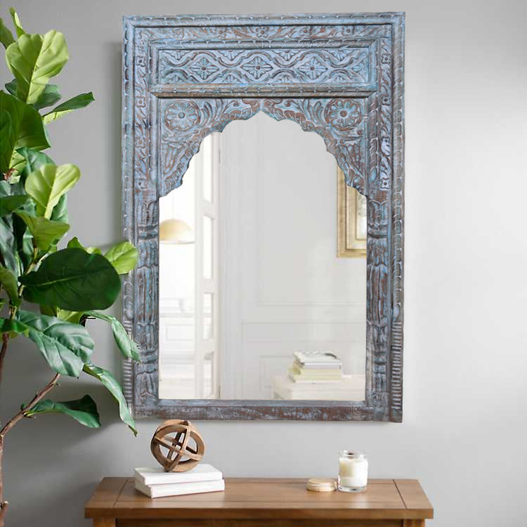 Mirror with plant.