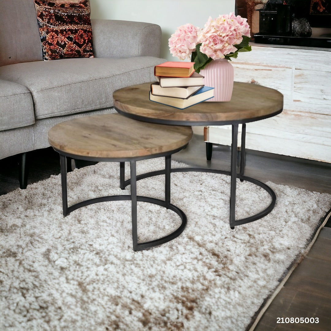 Compact nesting tables styled with décor accents