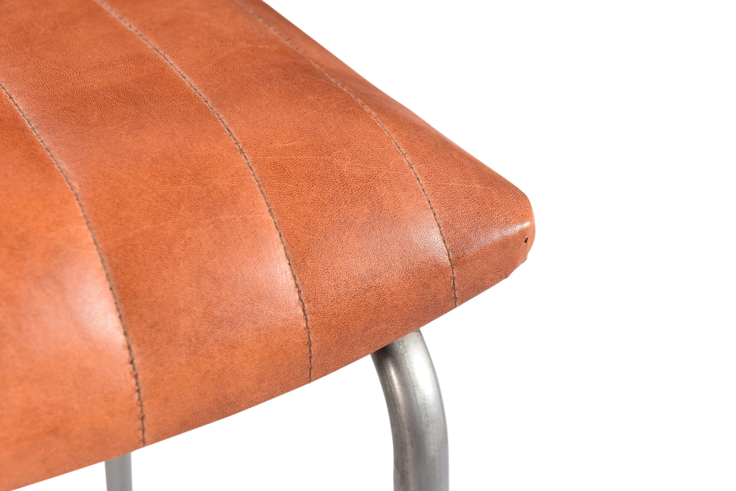 Close up bar stool seat corner.