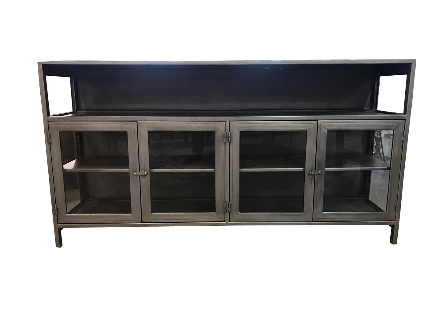Front view of a sleek media console with storage compartments.