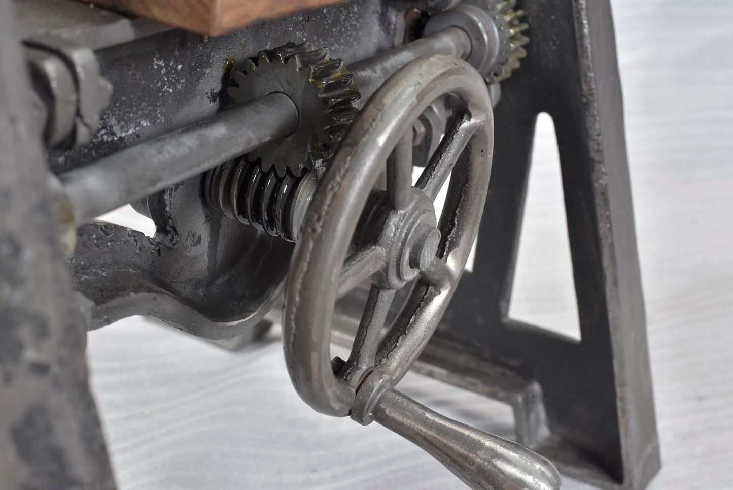 Close-up of crank detail on end table.
